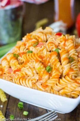 White bowl full of buffalo chicken pasta salad