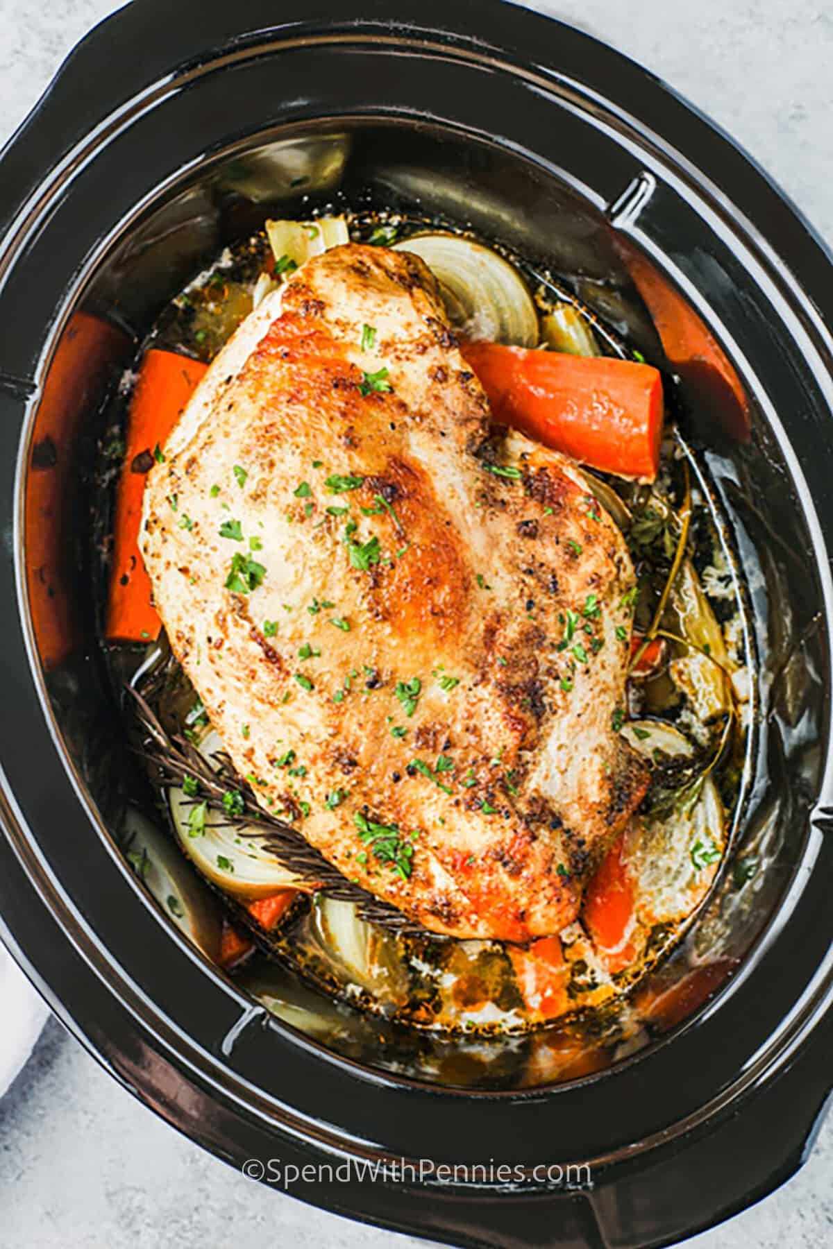 Crock Pot Turkey Breast with vegetables in the pot