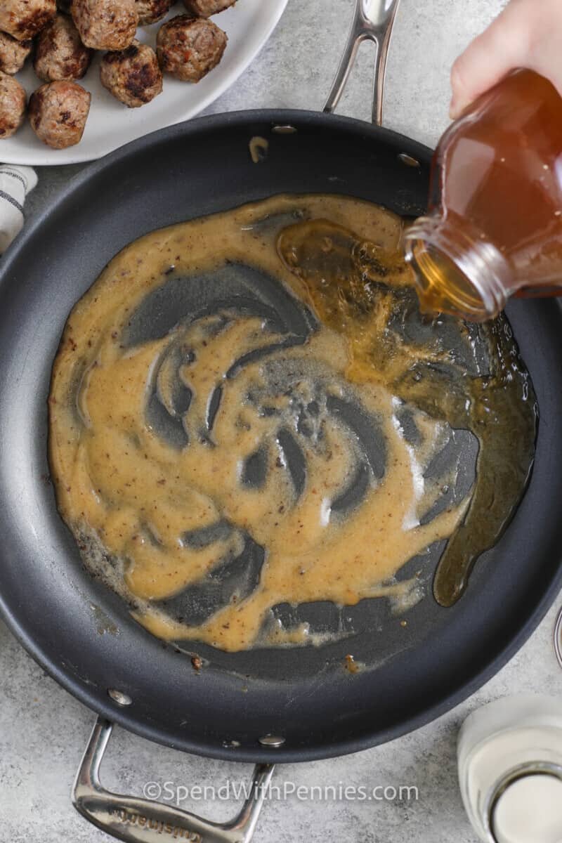 adding broth to pan to make Swedish Meatballs sauce